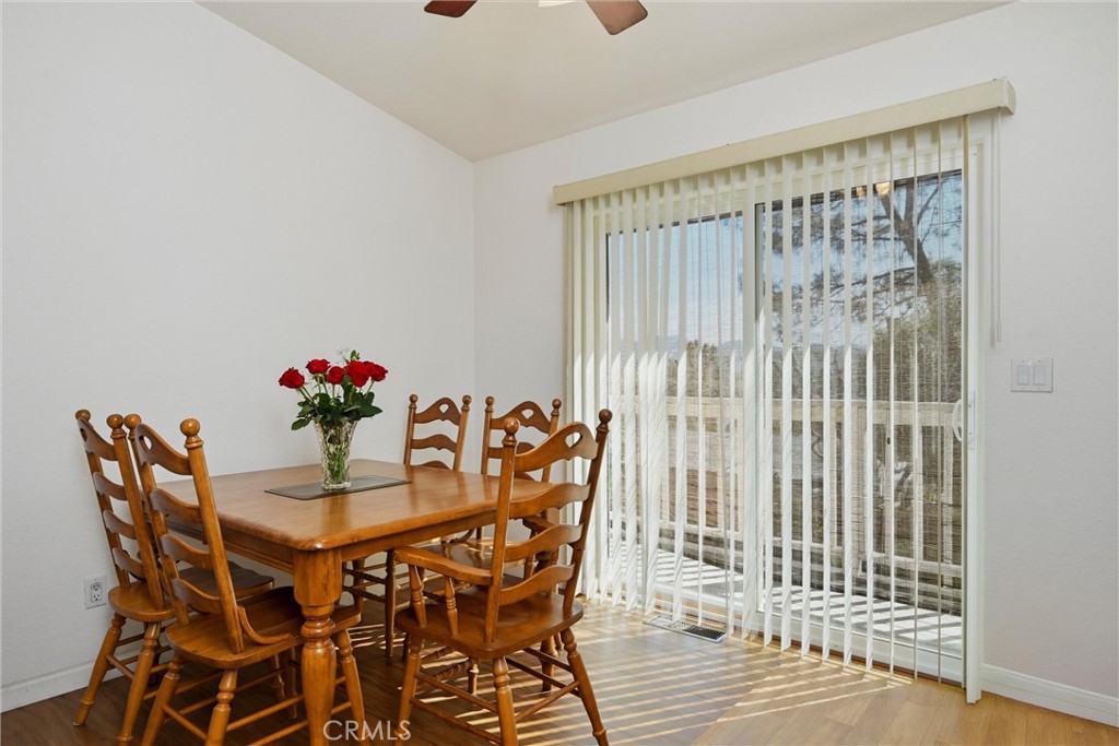 18685 Oak Grove Road Hidden Valley Lake, CA 95467 - Photo 7 of 52 a dining room with furniture and wooden floor
