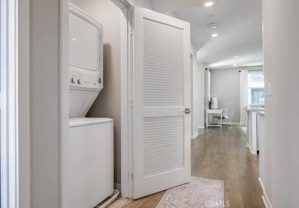 215 Bowery Irvine, CA 92612 - Photo 24 of 63 a view of a storage & utility room with closet washer