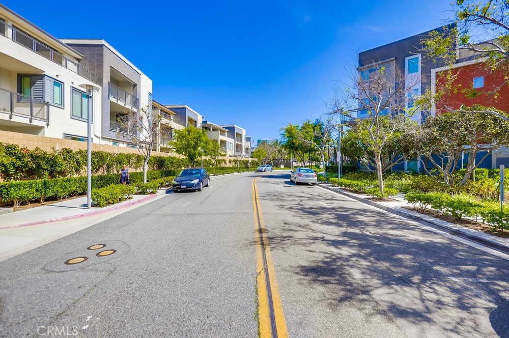 215 Bowery Irvine, CA 92612 - Photo 43 of 63 a car parked on the side of a street