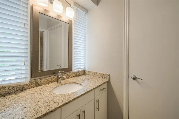 a bathroom with a bathtub and toilet