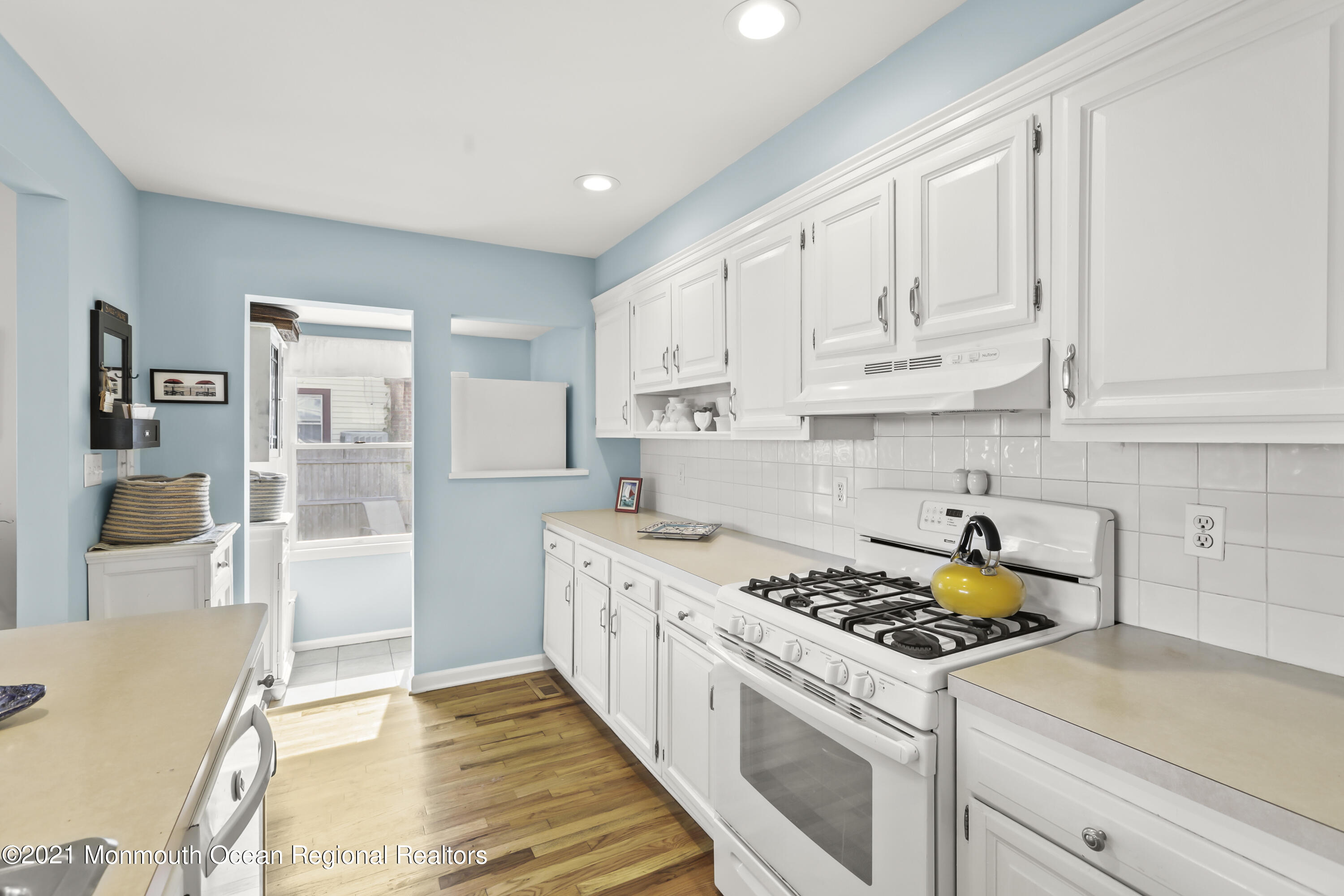 38 Hulse Landing Road Brick, NJ 08723 - Photo 18 of 38 a kitchen with a stove a sink and a refrigerator