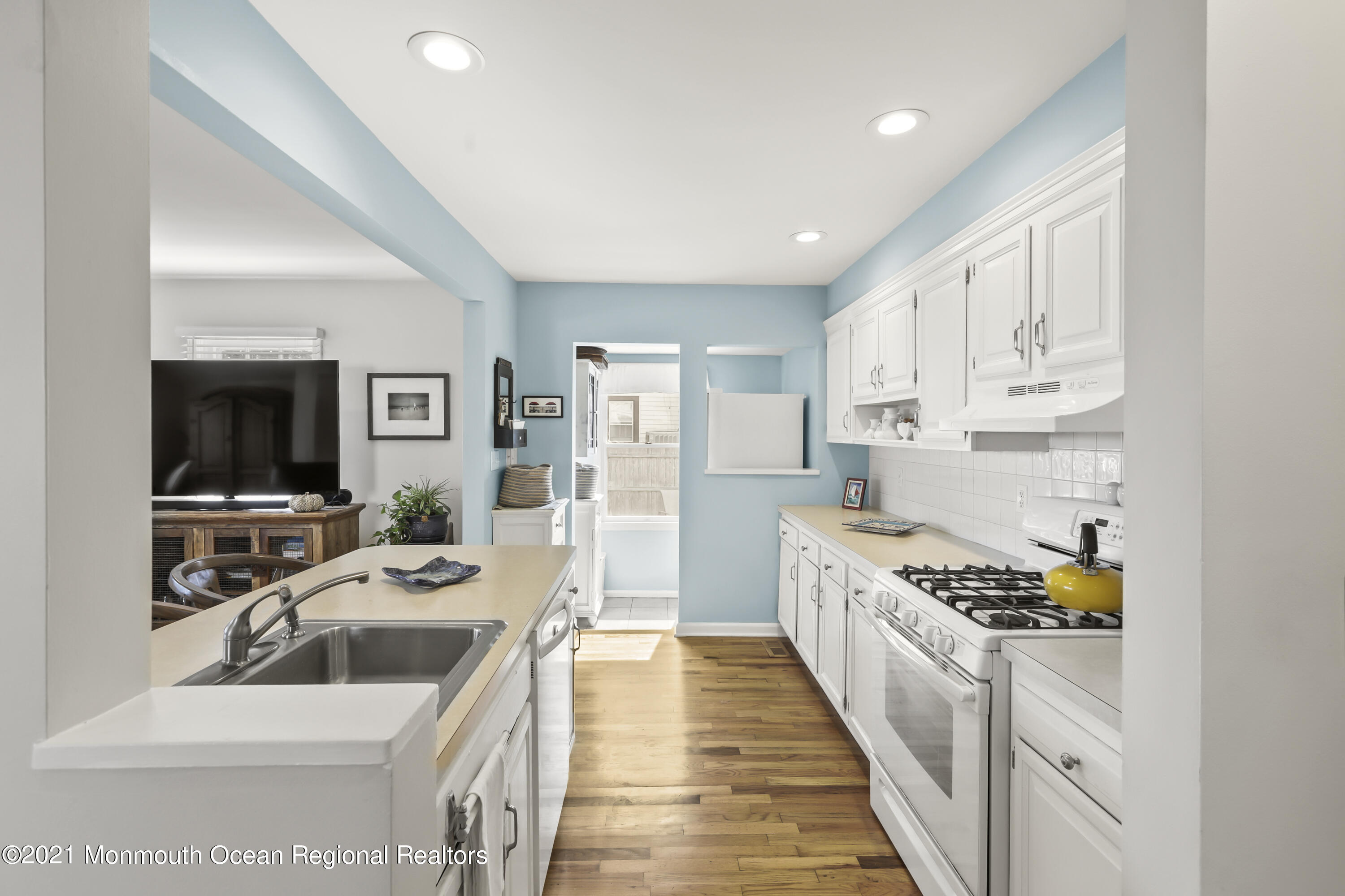 38 Hulse Landing Road Brick, NJ 08723 - Photo 19 of 38 a kitchen with stainless steel appliances a stove a sink a refrigerator and cabinets