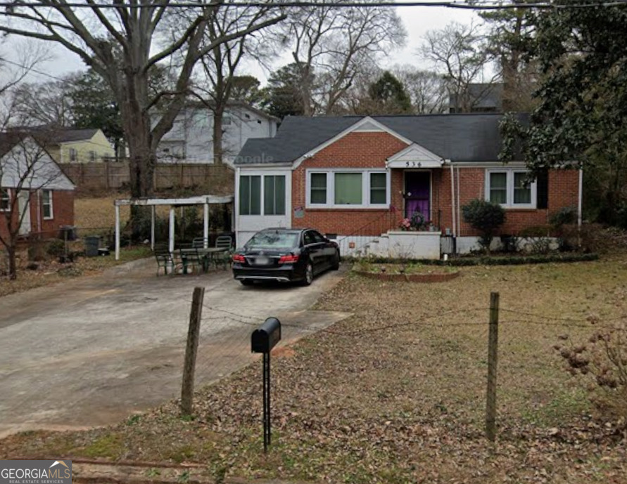 536 Allendale Drive Decatur, GA 30032 - Photo 1 of 10 a front view of a house with a yard
