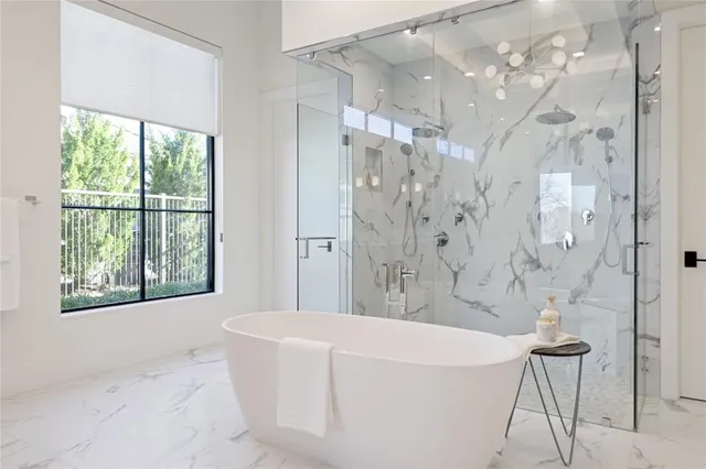 a bathroom with a granite countertop sink vanity and a mirror