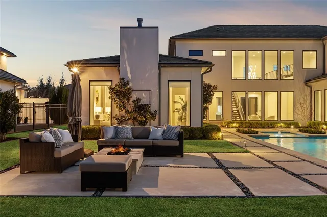 a view of a living room and floor to ceiling window