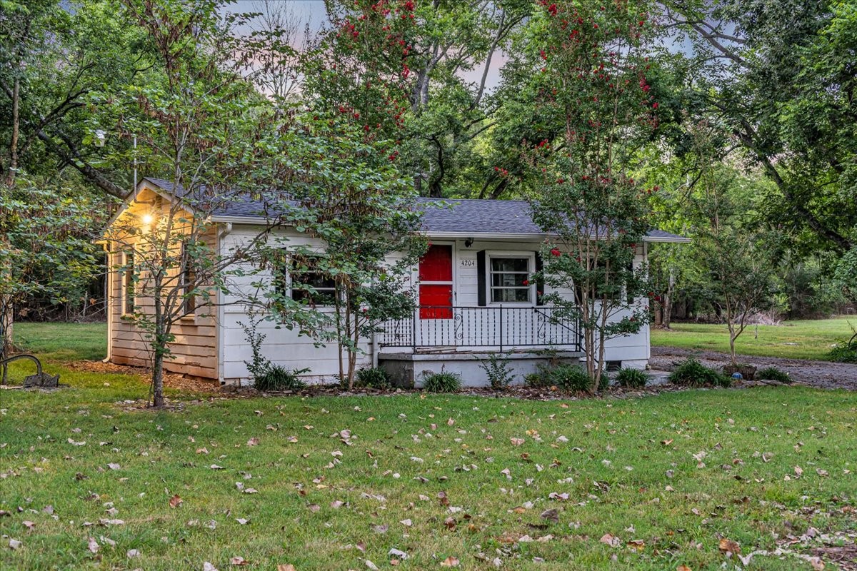 4204 Leanna Road Murfreesboro, TN 37129 - Photo 1 of 18 a front view of a house with a yard