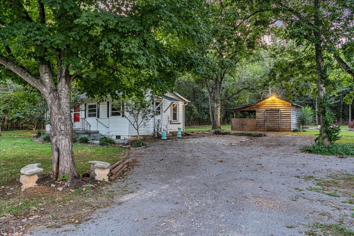 4204 Leanna Road Murfreesboro, TN 37129 - Photo 14 of 18 a view of a house with backyard and a tree