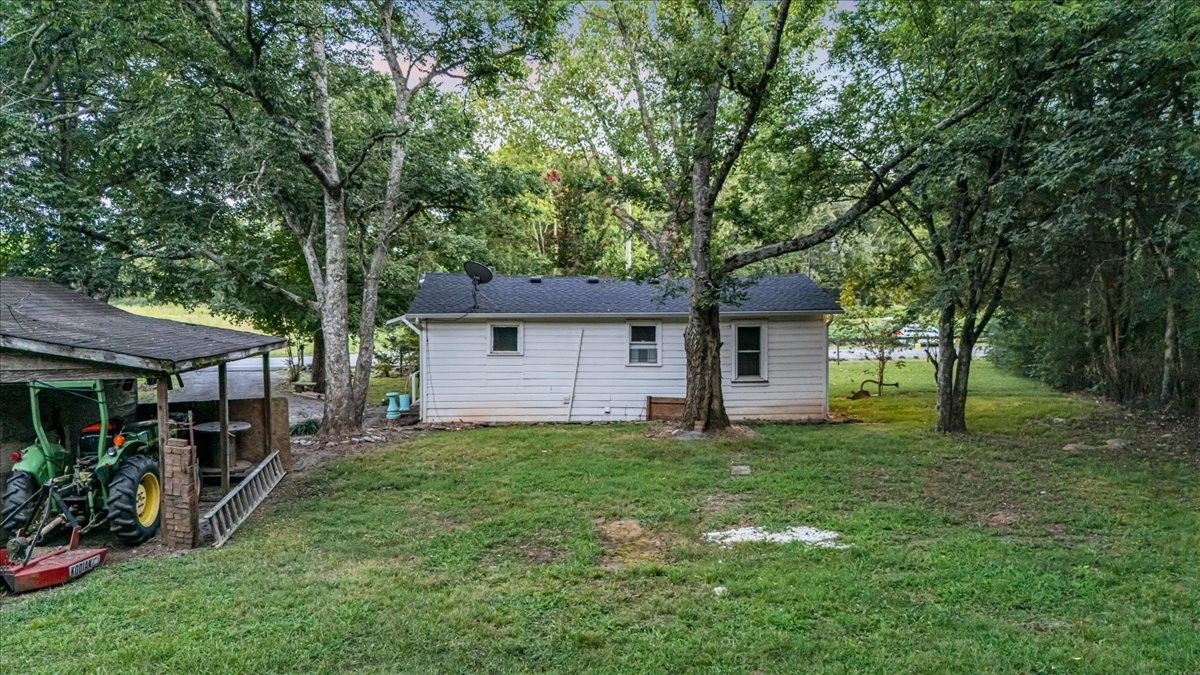 4204 Leanna Road Murfreesboro, TN 37129 - Photo 15 of 18 a backyard of a house with seating space
