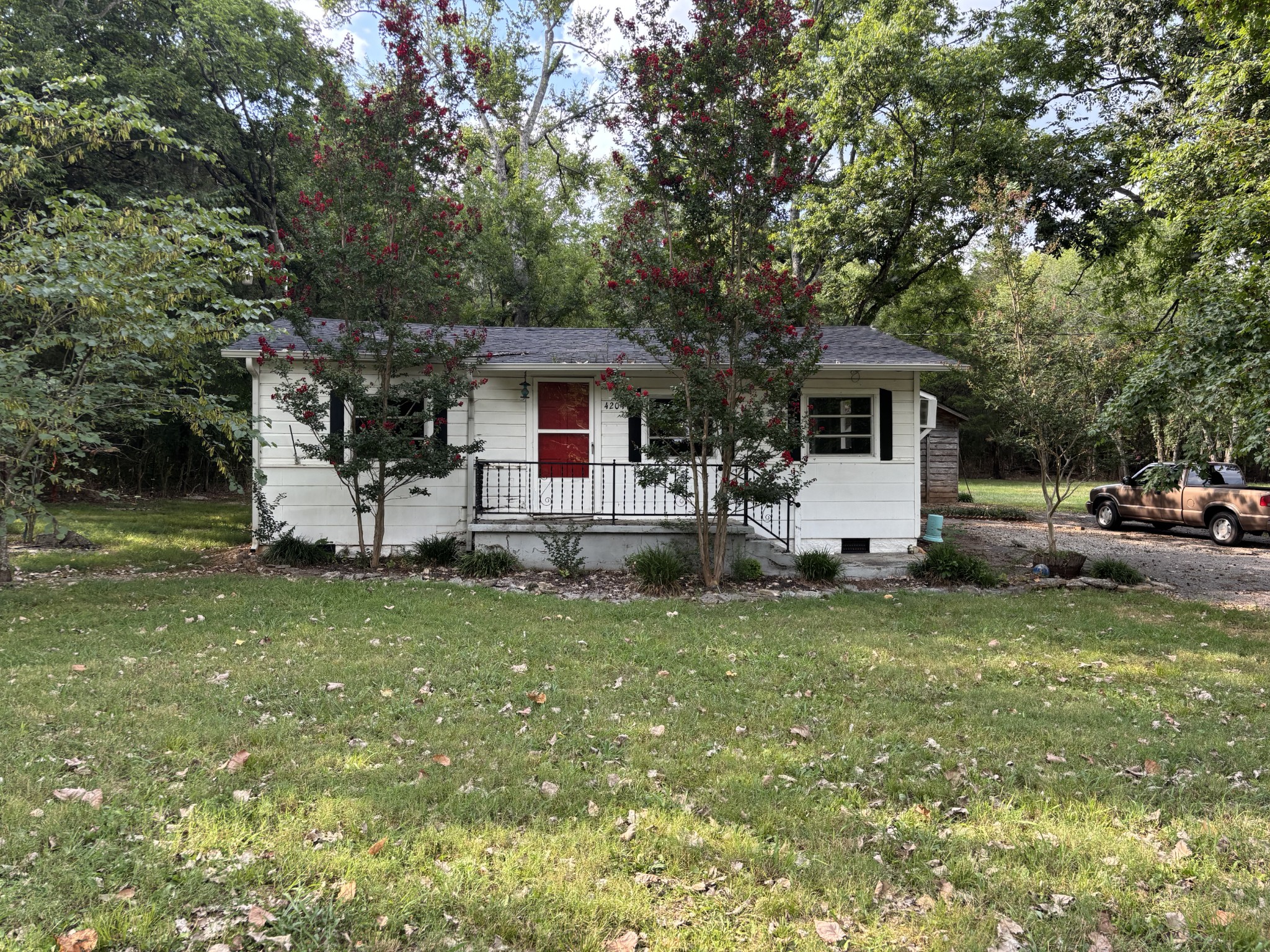 4204 Leanna Road Murfreesboro, TN 37129 - Photo 6 of 18 a front view of a house with garden