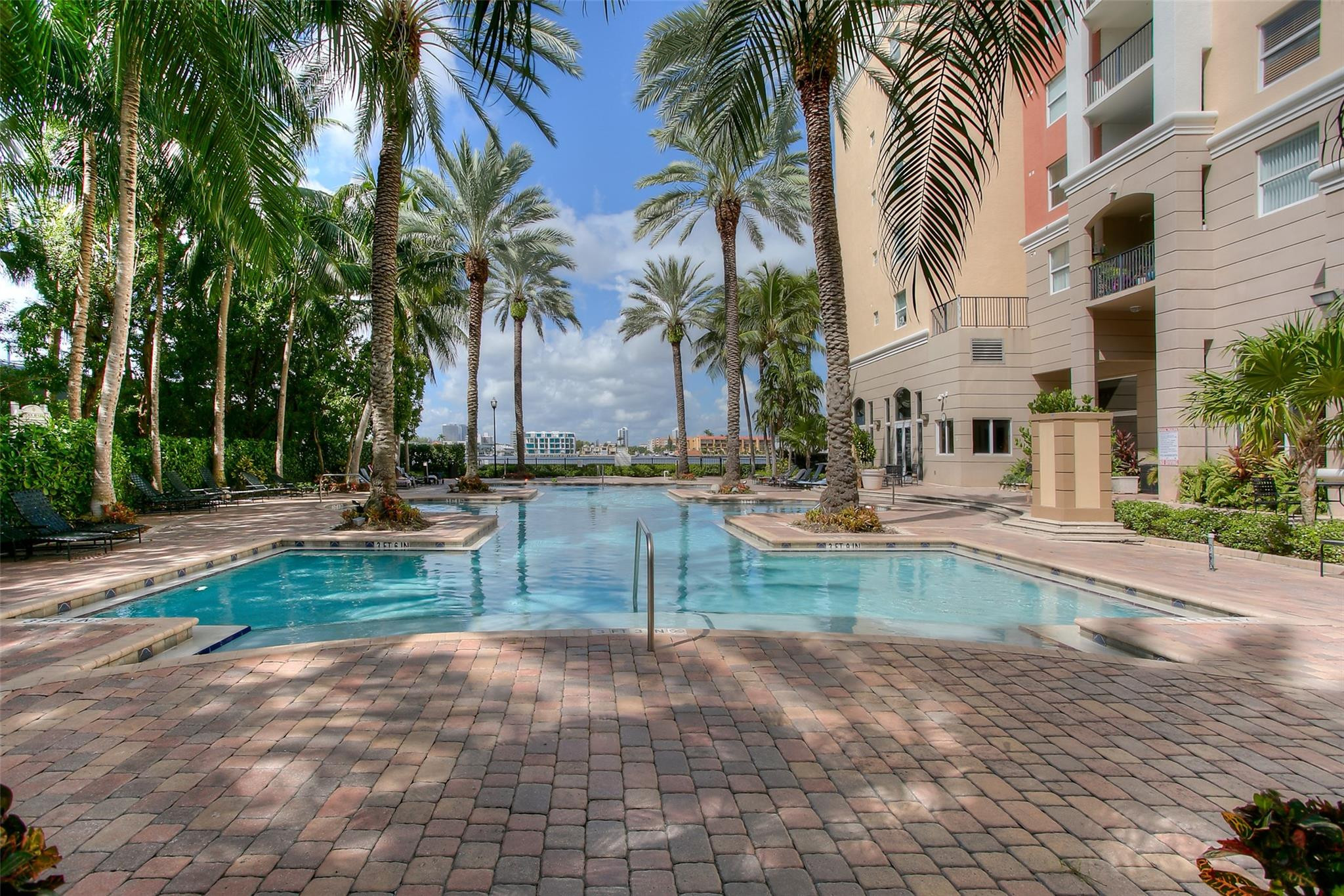 17150 North Bay Road, Unit 2218 Sunny Isles Beach, FL 33160 - Photo 11 of 15 a view of a swimming pool with a patio