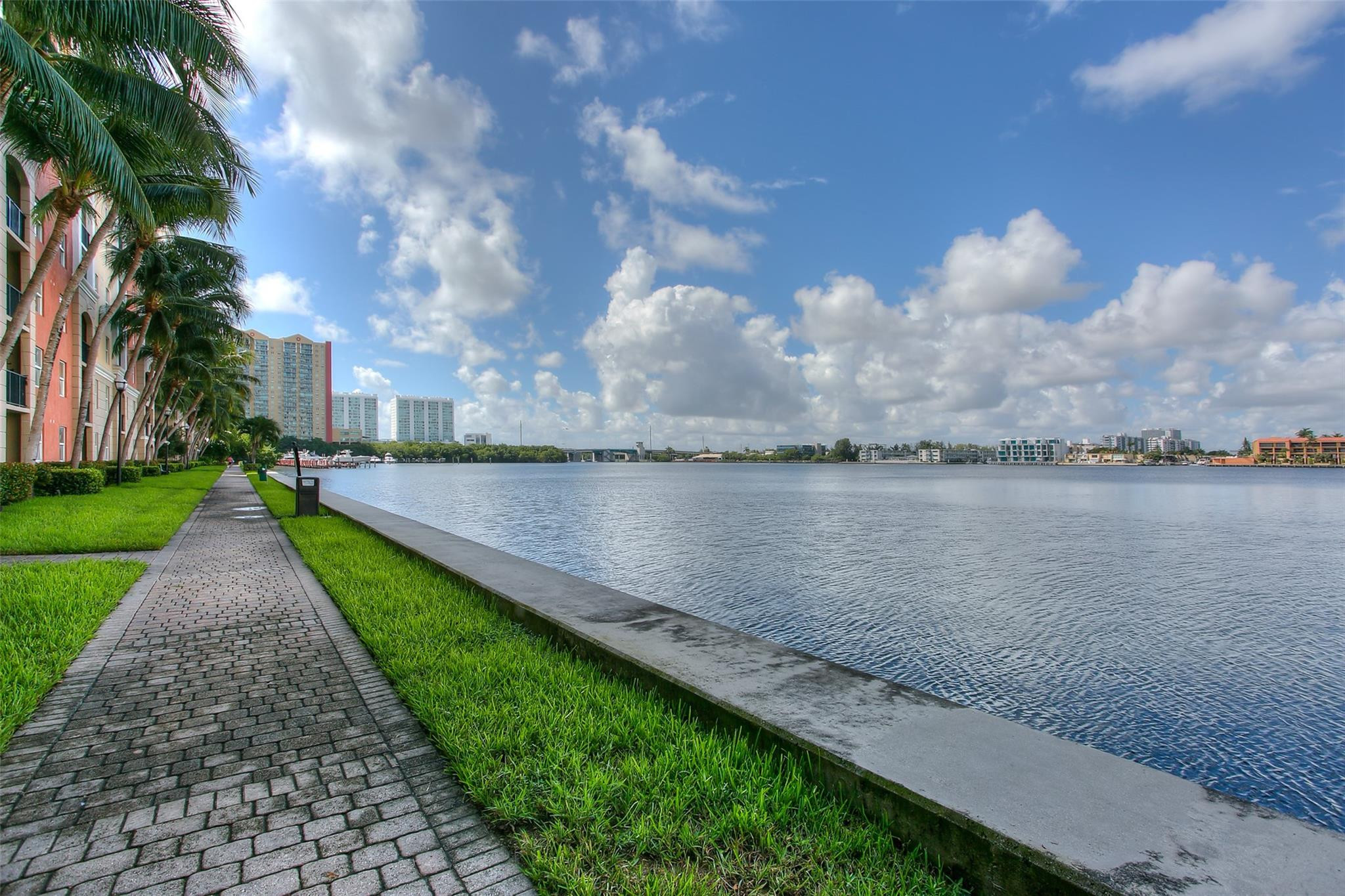 17150 North Bay Road, Unit 2218 Sunny Isles Beach, FL 33160 - Photo 13 of 15 a view of a lake with a yard