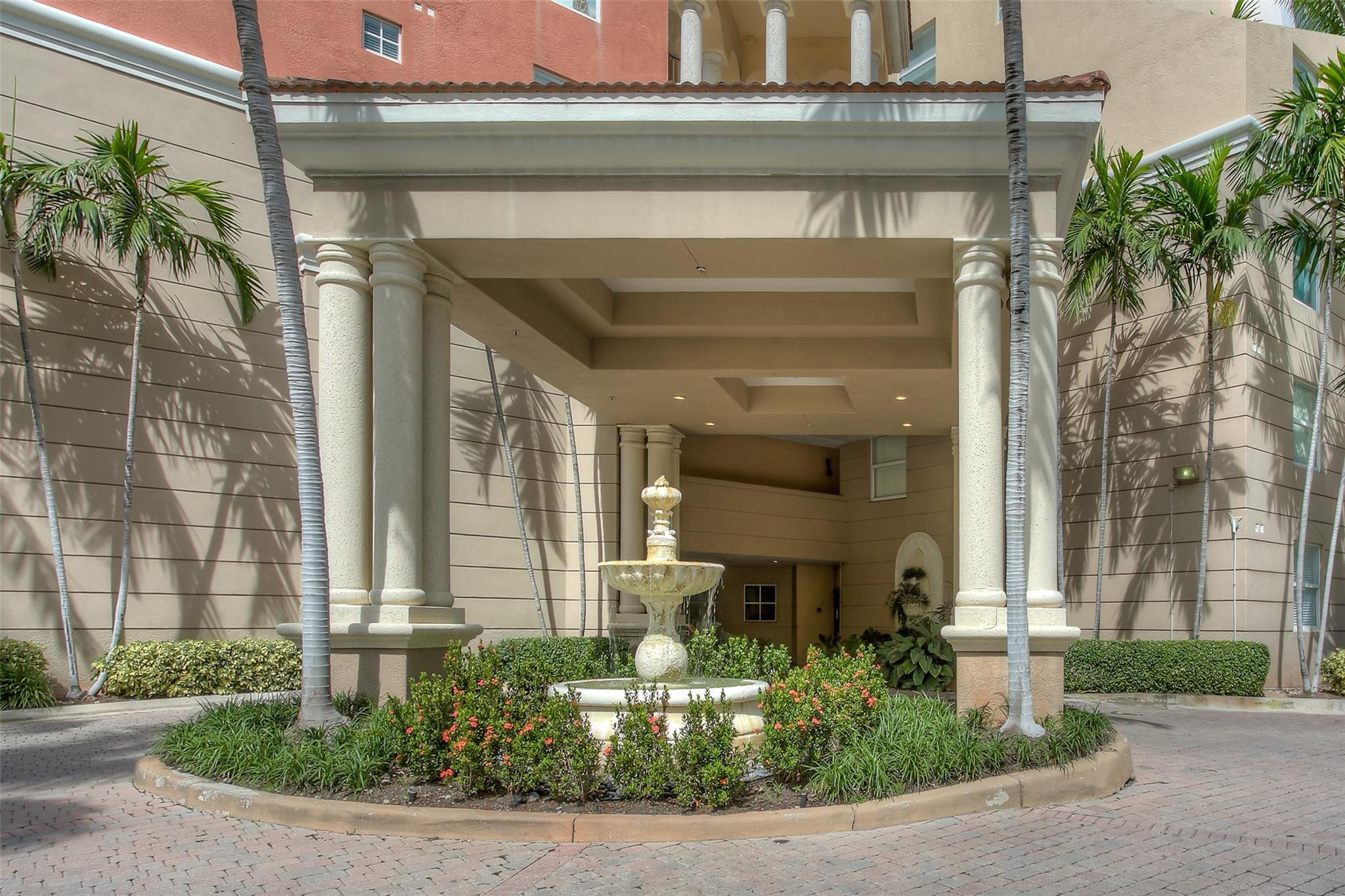 17150 North Bay Road, Unit 2218 Sunny Isles Beach, FL 33160 - Photo 14 of 15 a front view of a house with a yard