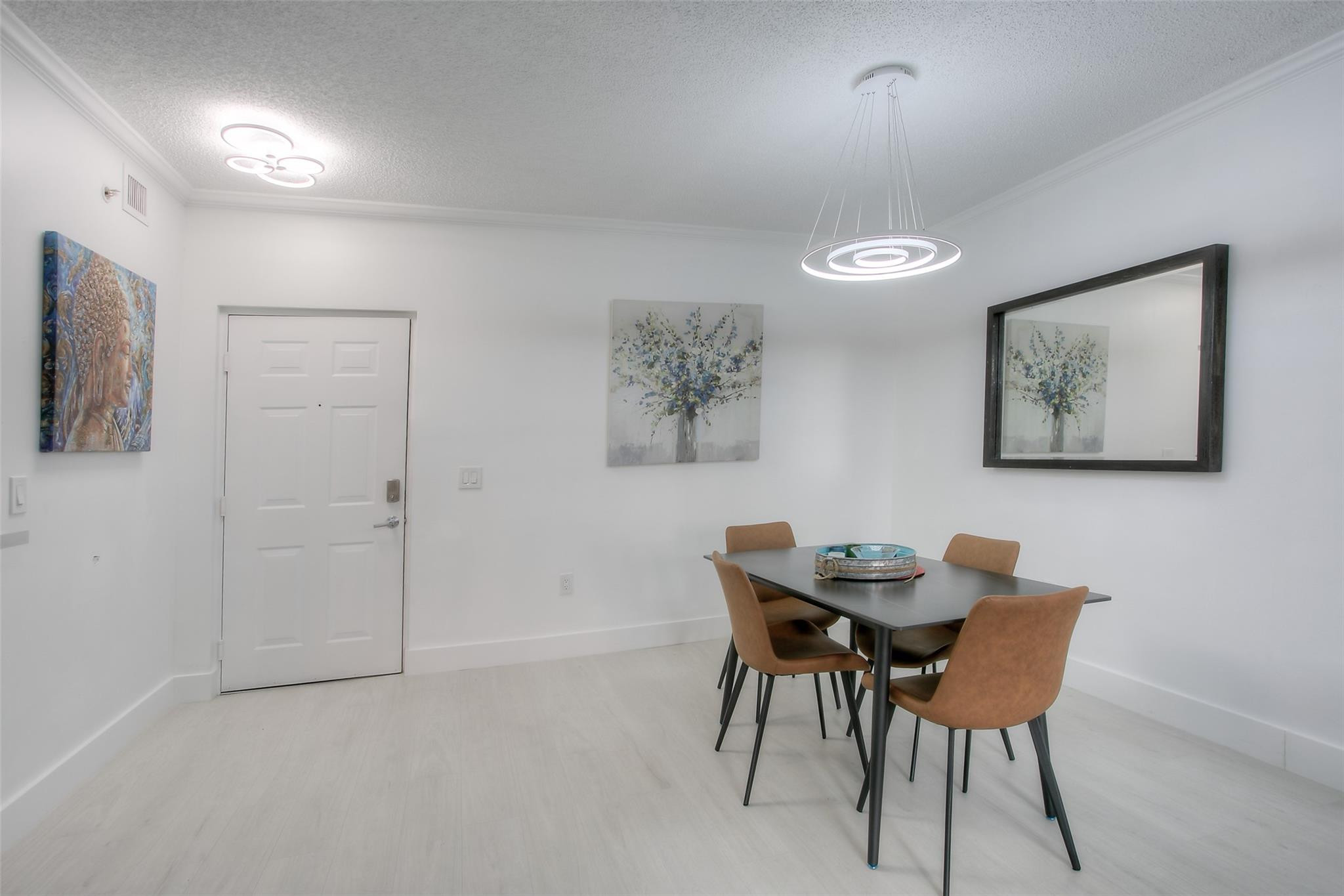 17150 North Bay Road, Unit 2218 Sunny Isles Beach, FL 33160 - Photo 2 of 15 a dining room with furniture and window