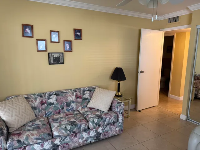 a bed room with a bed and a couch