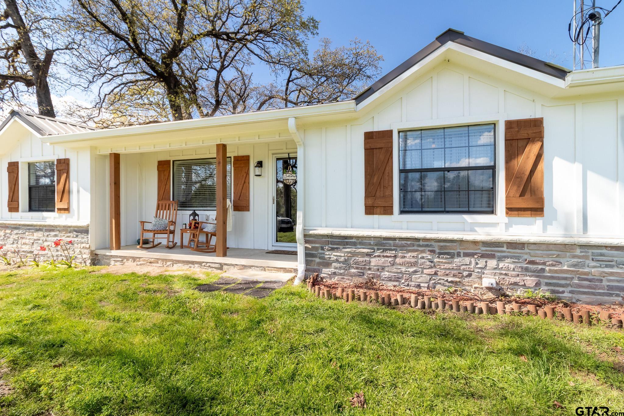 15540 State Highway 31 West Tyler, TX 75709 - Photo 1 of 37 a view of a house with a yard and sitting area