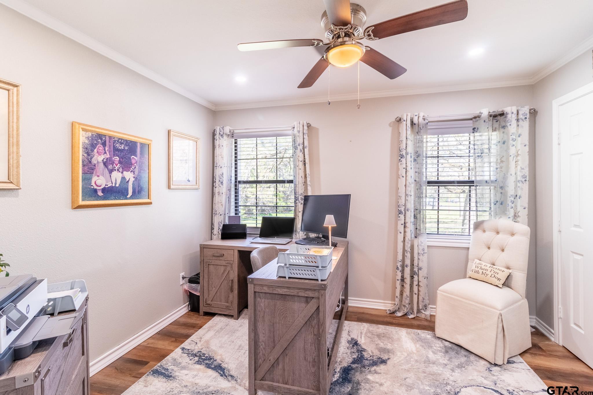 15540 State Highway 31 West Tyler, TX 75709 - Photo 18 of 37 a bedroom with furniture and a window