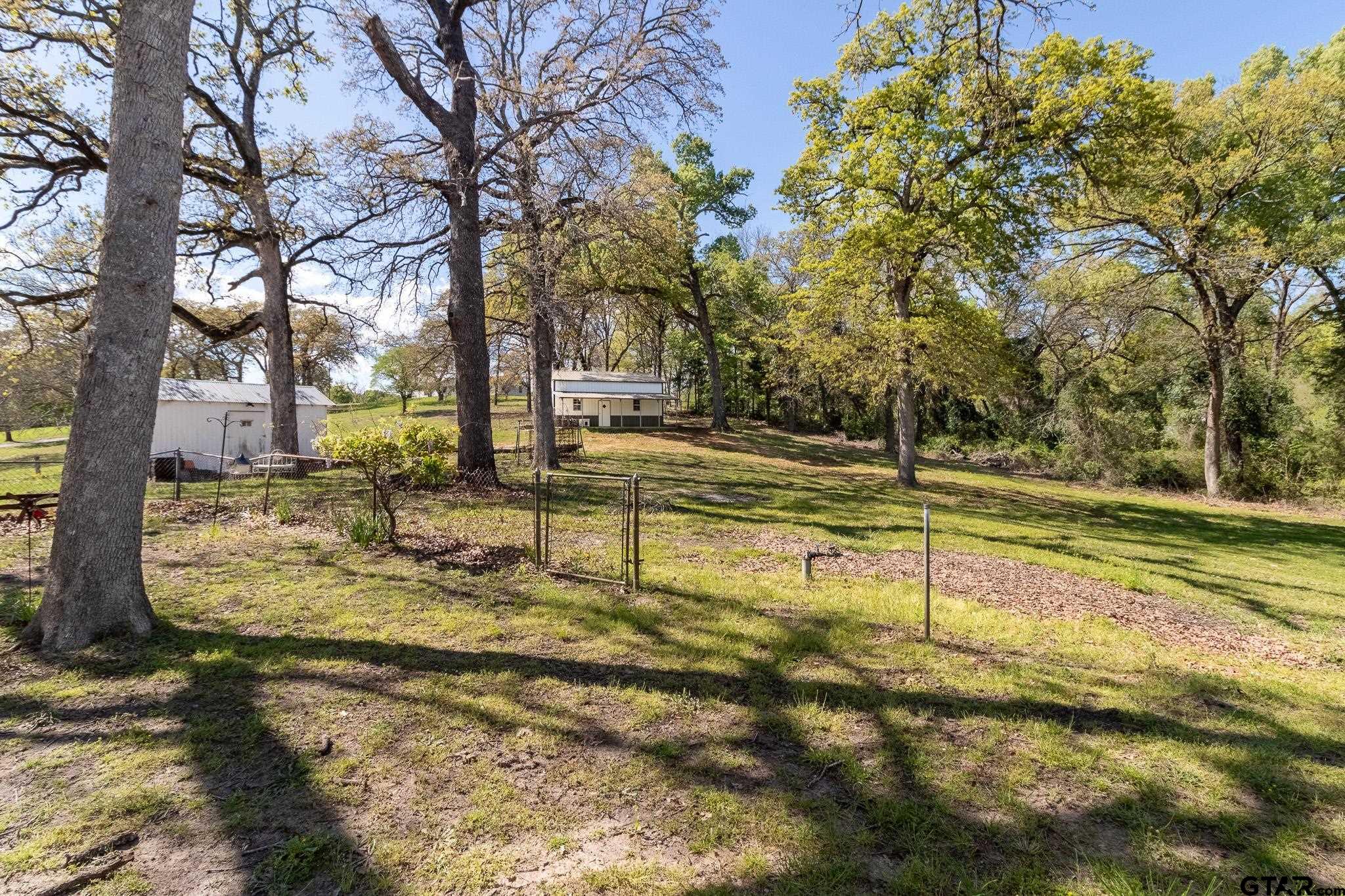 15540 State Highway 31 West Tyler, TX 75709 - Photo 28 of 37 a view of a yard with basketball court