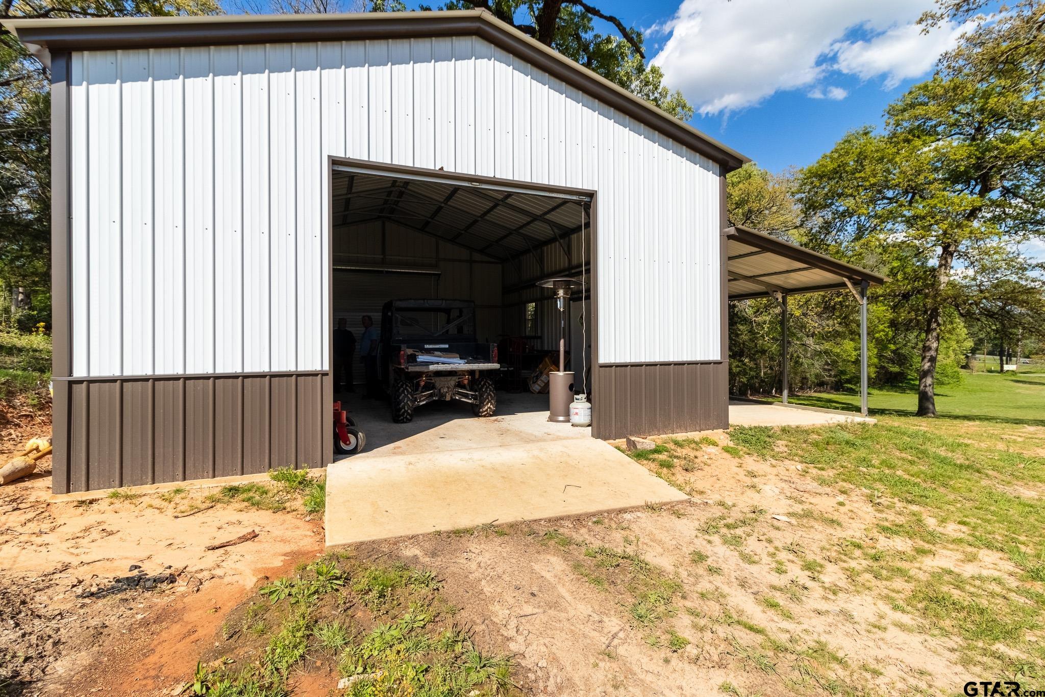15540 State Highway 31 West Tyler, TX 75709 - Photo 35 of 37 a view of backyard with a outdoor space