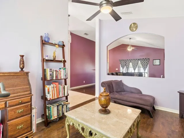 a view of a workspace with furniture