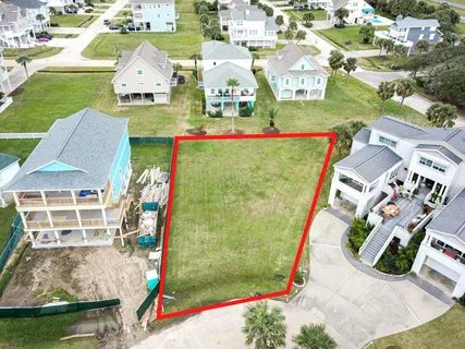 an aerial view of a house with outdoor space pool seating area and yard