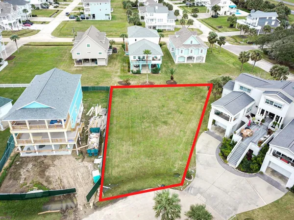 an aerial view of a house with outdoor space pool seating area and yard