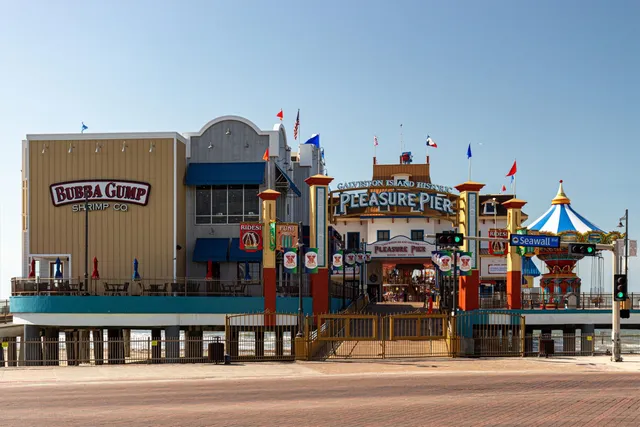 a front view of a building with retail shops