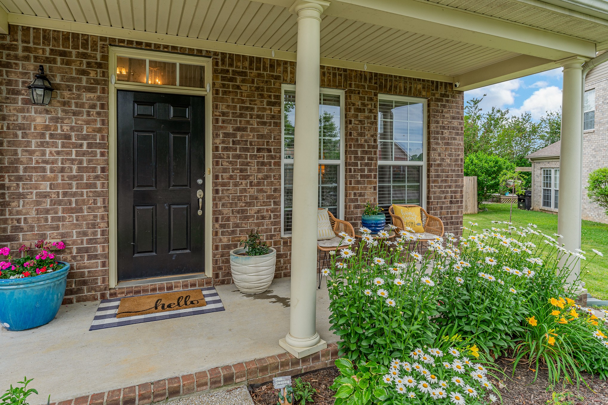 3002 Hope Circle Spring Hill, TN 37174 - Photo 2 of 25 a flower garden in front of a house