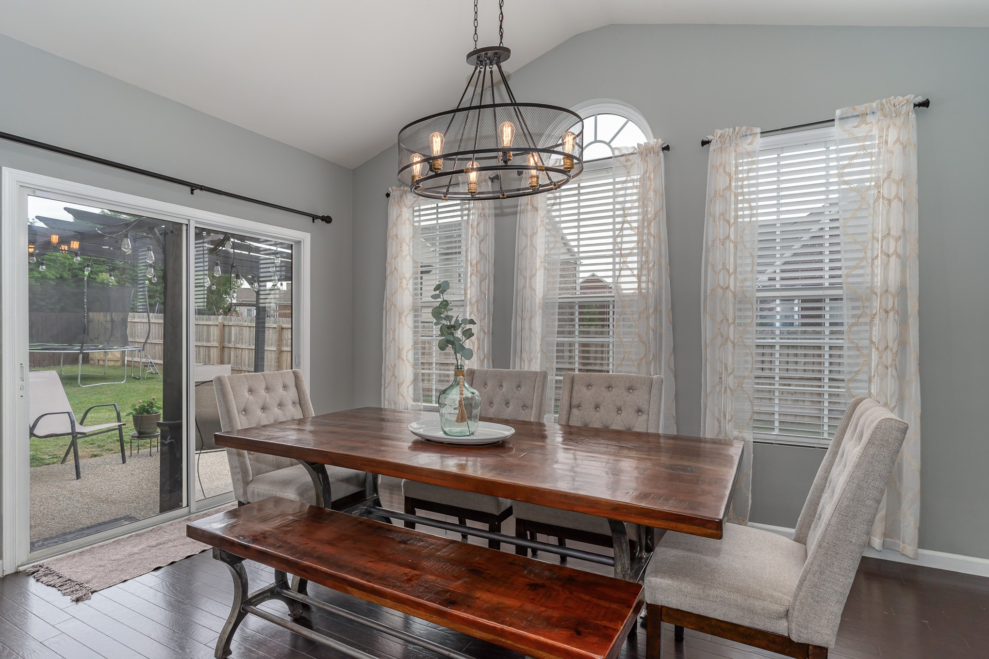 3002 Hope Circle Spring Hill, TN 37174 - Photo 11 of 25 a view of a dining room with furniture wooden floor and a chandelier