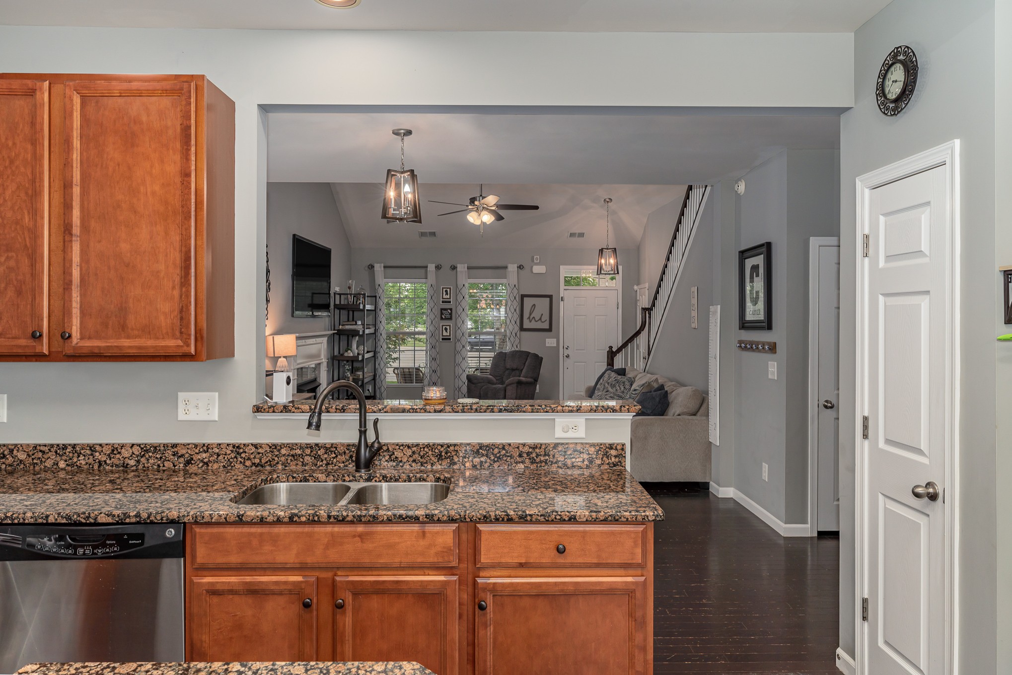 3002 Hope Circle Spring Hill, TN 37174 - Photo 12 of 25 a kitchen with stainless steel appliances granite countertop a sink a stove and a refrigerator