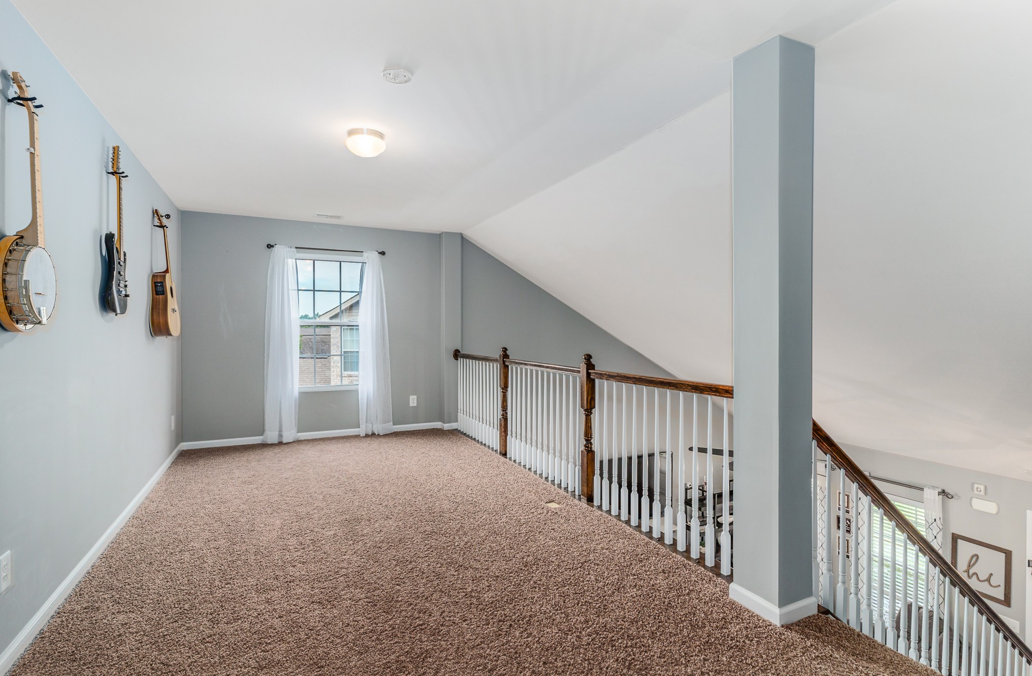 3002 Hope Circle Spring Hill, TN 37174 - Photo 18 of 25 a view of a hallway with window and stairs