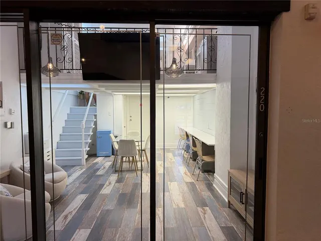 a view of a living room from a hallway