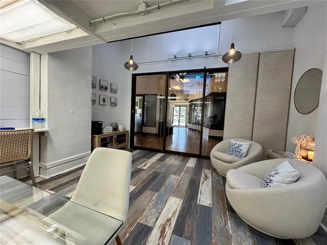 a living room with furniture and a rug