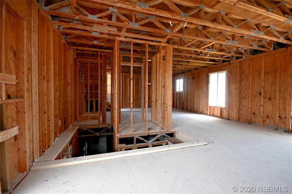 6829 Turtlemound Road New Smyrna Beach, FL 32169 - Photo 19 of 38 a view of a room with gym equipment