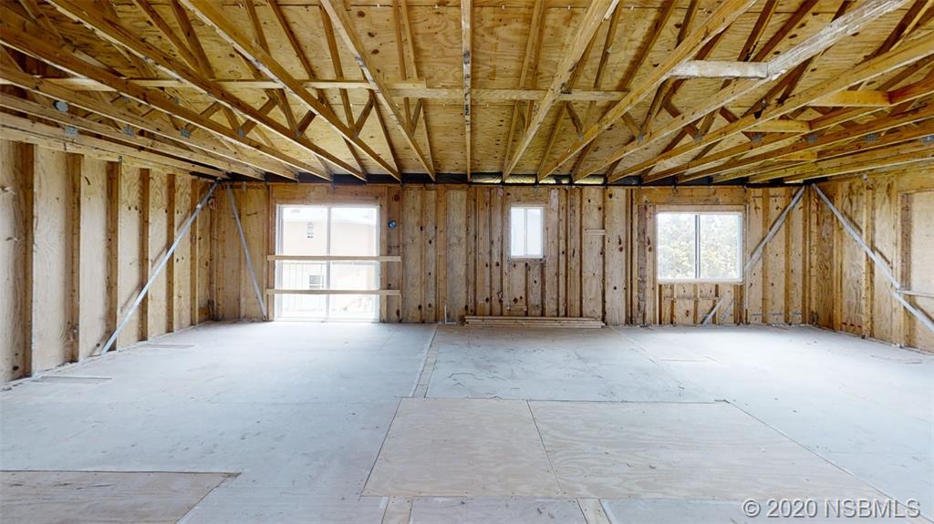 6829 Turtlemound Road New Smyrna Beach, FL 32169 - Photo 36 of 38 a view of empty room with windows