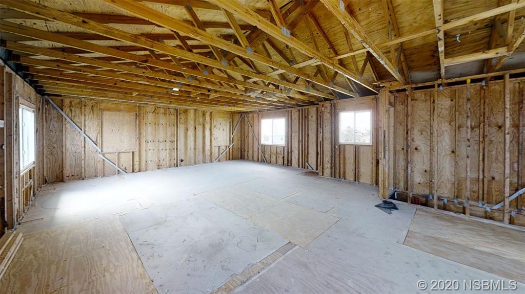6829 Turtlemound Road New Smyrna Beach, FL 32169 - Photo 38 of 38 a view of a room with wooden walls