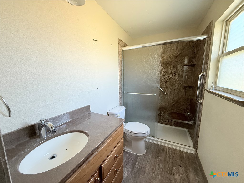 4700 Old Howard Road Temple, TX 76504 - Photo 17 of 33 a bathroom with a sink toilet and shower