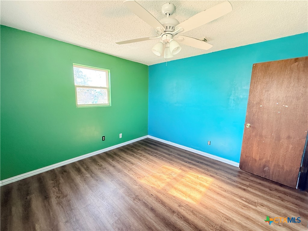 4700 Old Howard Road Temple, TX 76504 - Photo 19 of 33 a view of empty room with window and fan