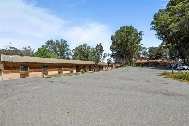 a view of a road with an outdoor space
