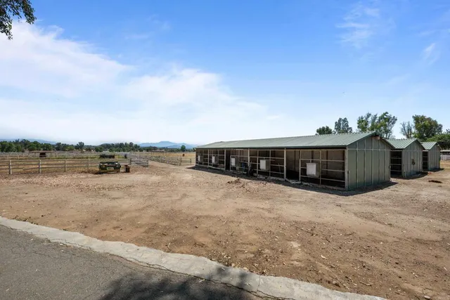a view of a house with a garden