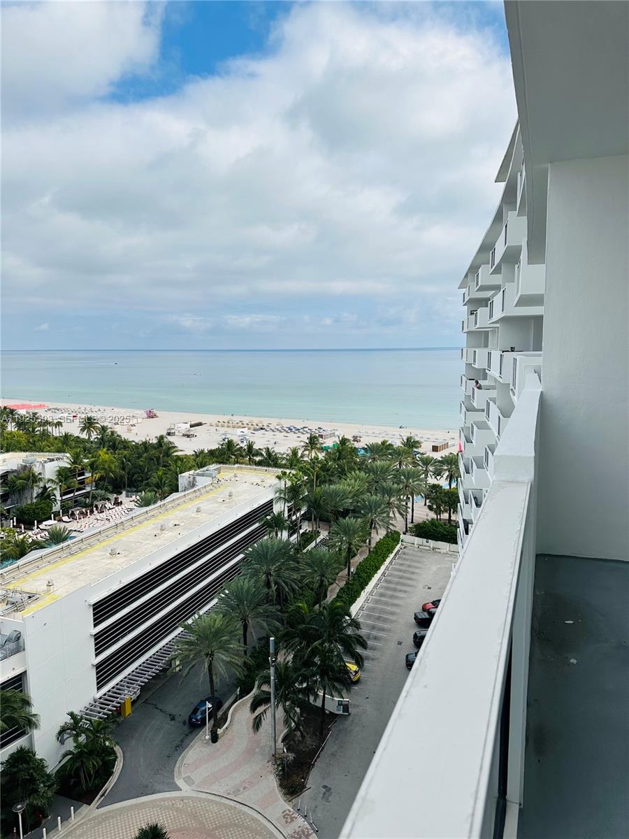100 Lincoln Road, Unit 1427 Miami Beach, FL 33139 - Photo 20 of 30 a view of a terrace with a bench
