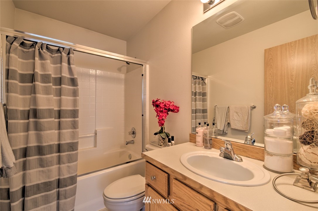 3114 Southeast 3rd Street Renton, WA 98056 - Photo 13 of 25 a bathroom with a sink toilet and shower