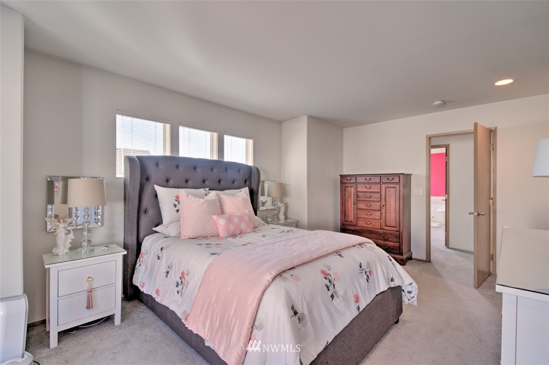 3114 Southeast 3rd Street Renton, WA 98056 - Photo 19 of 25 a bed room with a bed and a night stand