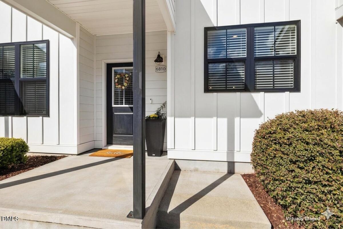 6810 Milligan Way, Unit 103 Raleigh, NC 27613 - Photo 2 of 37 a balcony view with a outdoor space