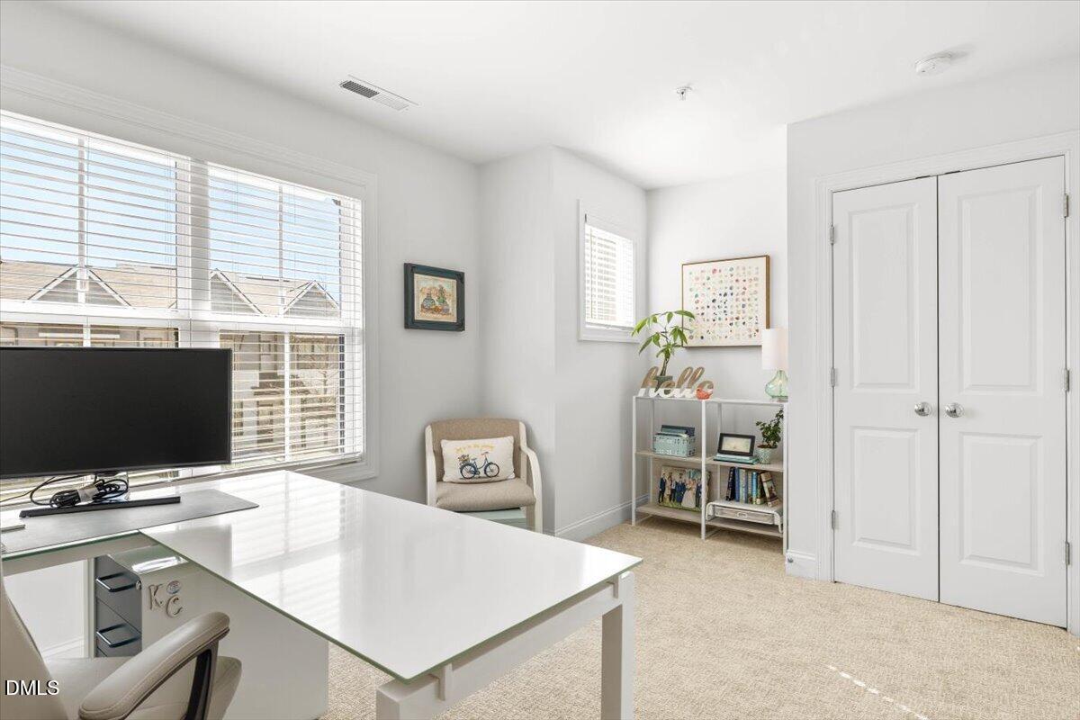6810 Milligan Way, Unit 103 Raleigh, NC 27613 - Photo 28 of 37 a view of a workspace with furniture