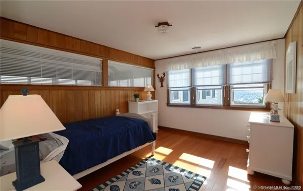 a bathroom with a sink vanity and a mirror