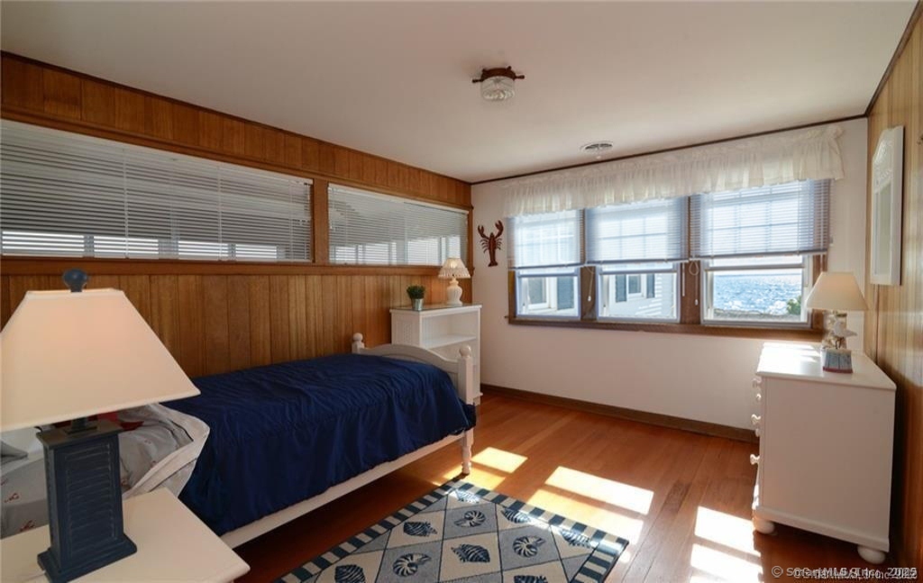 10 Weston Road Groton, CT 06340 - Photo 17 of 37 a bedroom with furniture and a window