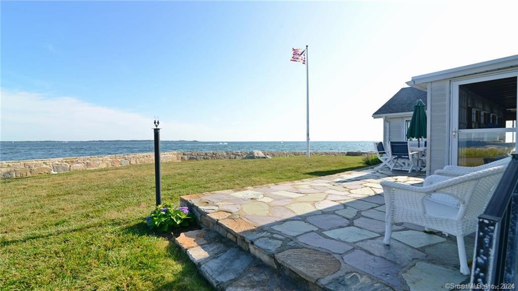 10 Weston Road Groton, CT 06340 - Photo 23 of 37 a view of an ocean with a floor to ceiling window