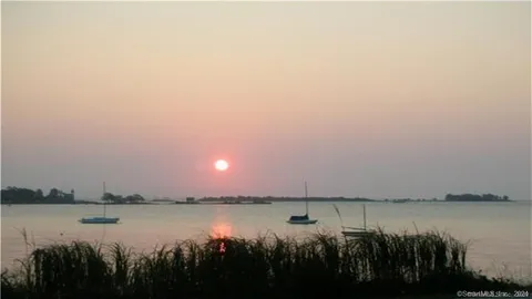 a view of a balcony with an ocean view