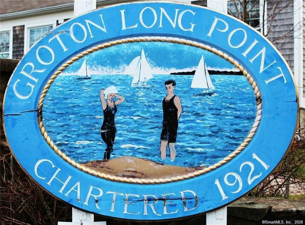 10 Weston Road Groton, CT 06340 - Photo 37 of 37 a view of a wooden bench with a wooden fence