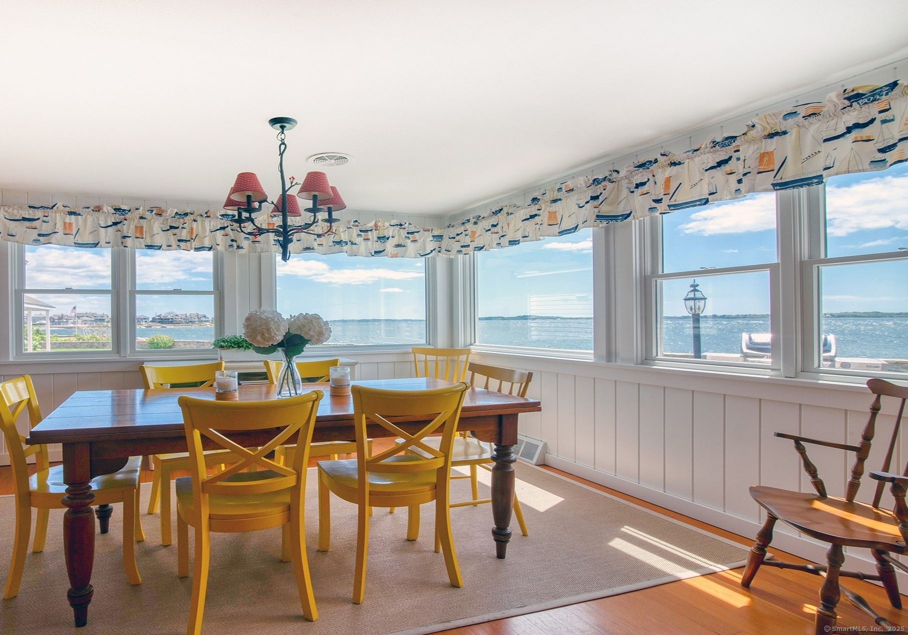 10 Weston Road Groton, CT 06340 - Photo 6 of 37 a view of a dining room with furniture and window